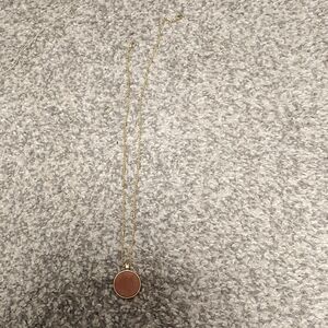 Elegant Gold Necklace with Gem Pendant